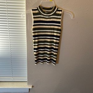 Small sweater with no sleeves it’s navy blue yellow and green never been worn